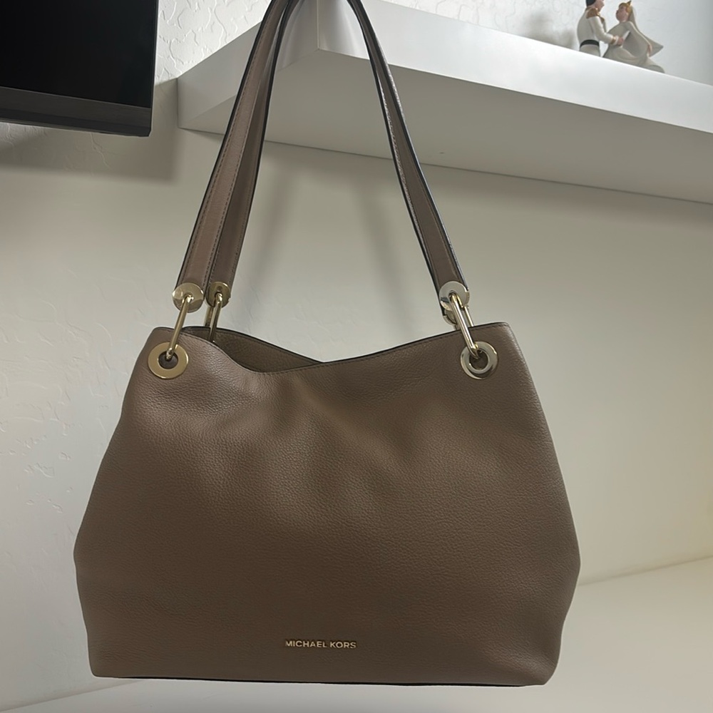 Beautiful new condition Michael Kors handbag. Taupe color